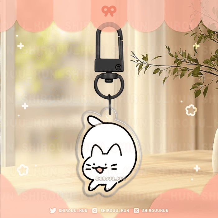[i.] cat doodle keychains