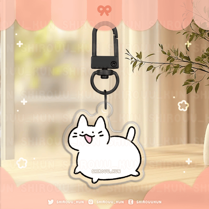 [e.] cat doodle keychains